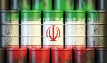 Ölfässer in Farben der iranischen Flagge